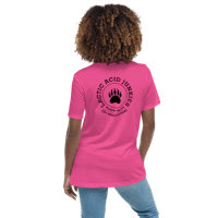 the back of a woman wearing a pink t - shirt with a bear paw on it