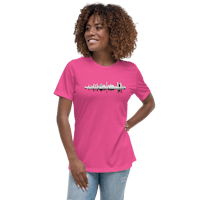 a woman wearing a pink t - shirt with a sound wave on it